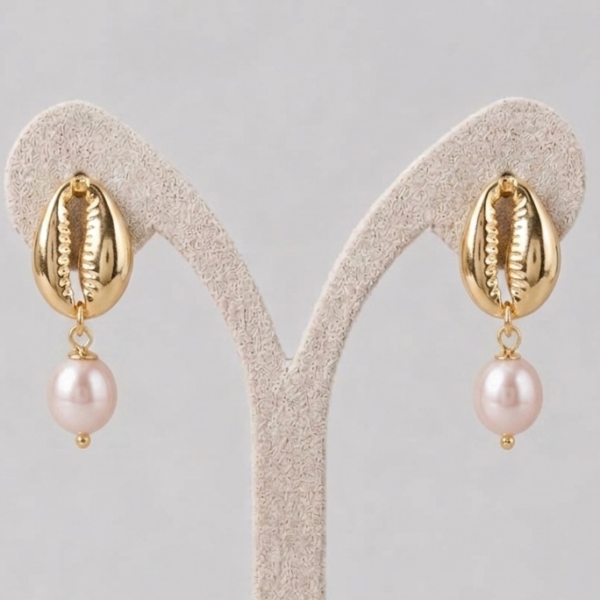 Elegant pink pearl cowrie shell earrings crafted with 24k gold color brass and light pinkish pearls.
