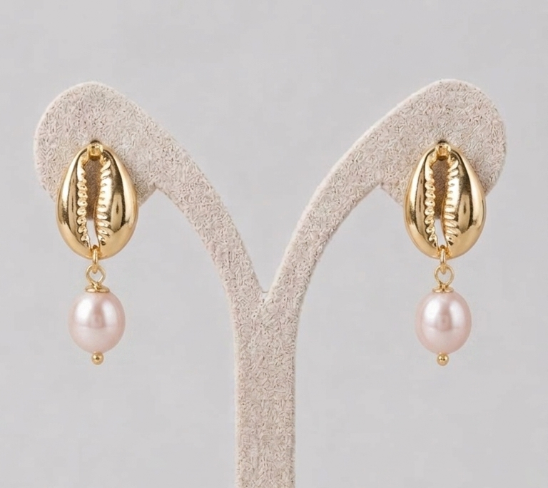 Elegant pink pearl cowrie shell earrings crafted with 24k gold color brass and light pinkish pearls.